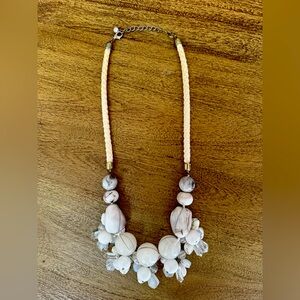 Cool/chunky — white and clear stone necklace.